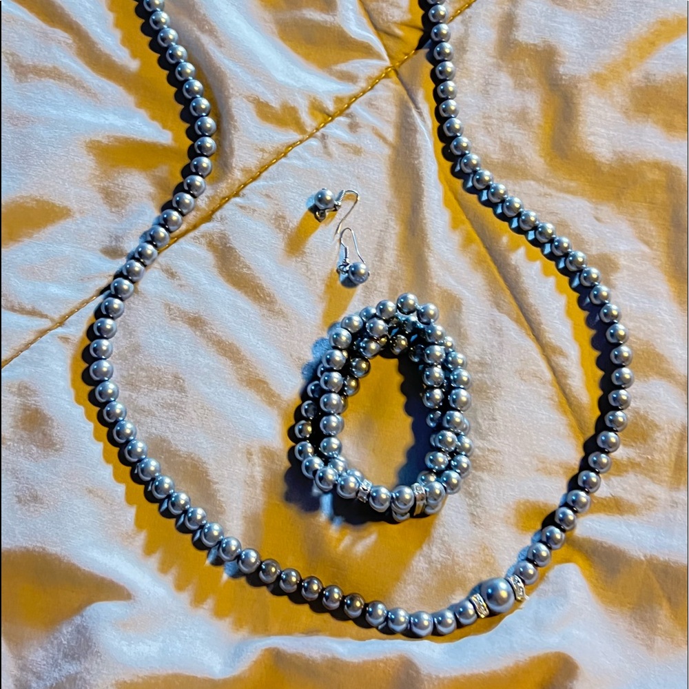 Necklace, bracelet and earrings